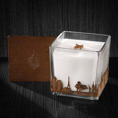 Image of a 4x4x4 soy candle featuring a mahogany scent, crackling wood wick, with a wood lid and a Las Vegas City skyline wrap design.