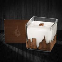 Image of a 4x4x4 soy candle featuring a mahogany scent, crackling wood wick, with a wood lid and a Orlando, FL City skyline wrap design.