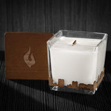 Image of a 3x3x3 soy candle featuring a mahogany scent, crackling wood wick, with a wood lid and a Madison City skyline wrap design.