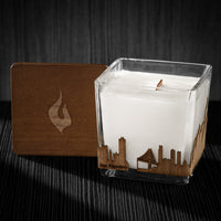 Image of a 3x3x3 soy candle featuring a mahogany scent, crackling wood wick, with a wood lid and a San Francisco skyline wrap design.