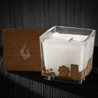 Image of a 3x3x3 soy candle featuring a mahogany scent, crackling wood wick, with a wood lid and a Santa Monica skyline wrap design.