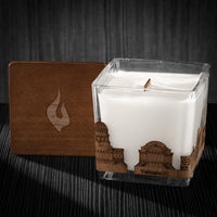 Image of a 3x3x3 soy candle featuring a mahogany scent, crackling wood wick, with a wood lid and a Washington, DC skyline wrap design.