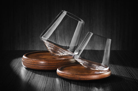 12oz revolving glass with a reversible wood coaster, next to the 5oz revolving glass for size comparison.  