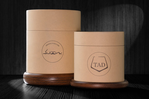 12oz revolving glass with a reversible wood coaster, next to the 5oz revolving glass for size comparison.  
