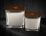 Image of a 3x3x3 and 4x4x4 soy candles to compare the difference in size.