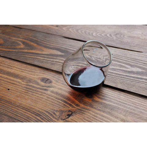 Swoon 12 oz Revolving Wine Glass.   The revolving motion aerates the liquid. Aeration, simply means exposing the liquid to air or giving it a chance to "breathe" before drinking it. The reaction between gases in the air and beverages changes the flavor. 